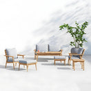 Switch A 7-piece outdoor seating set made of solid Red Oak wood, including a loveseat, two armchairs, two ottomans, and a coffee table. 2 image