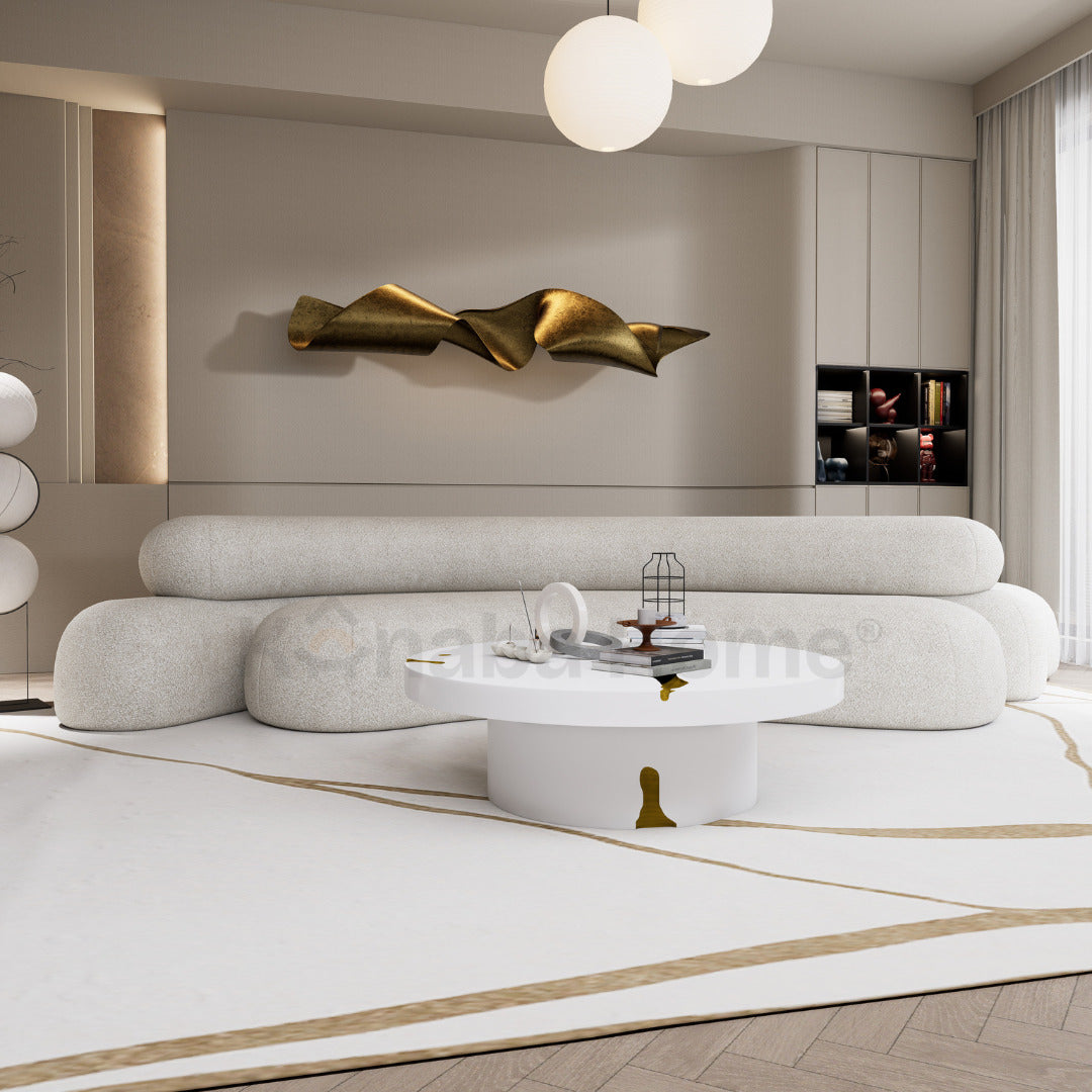 Modern curved sofa in white boucle