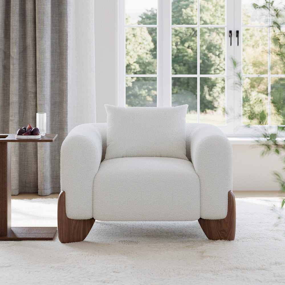 White armchair with wooden walnut legs
