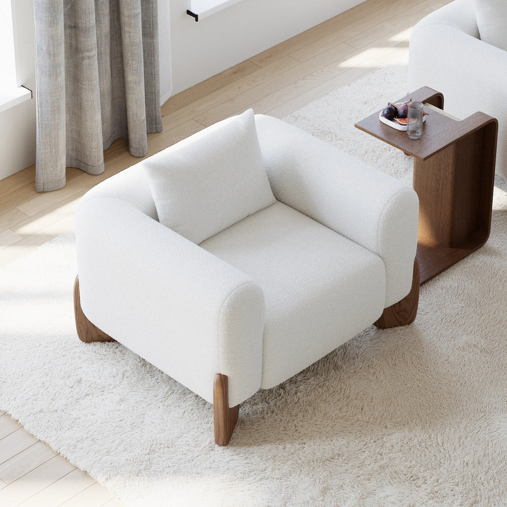 white armchair in dubai with walnut legs
