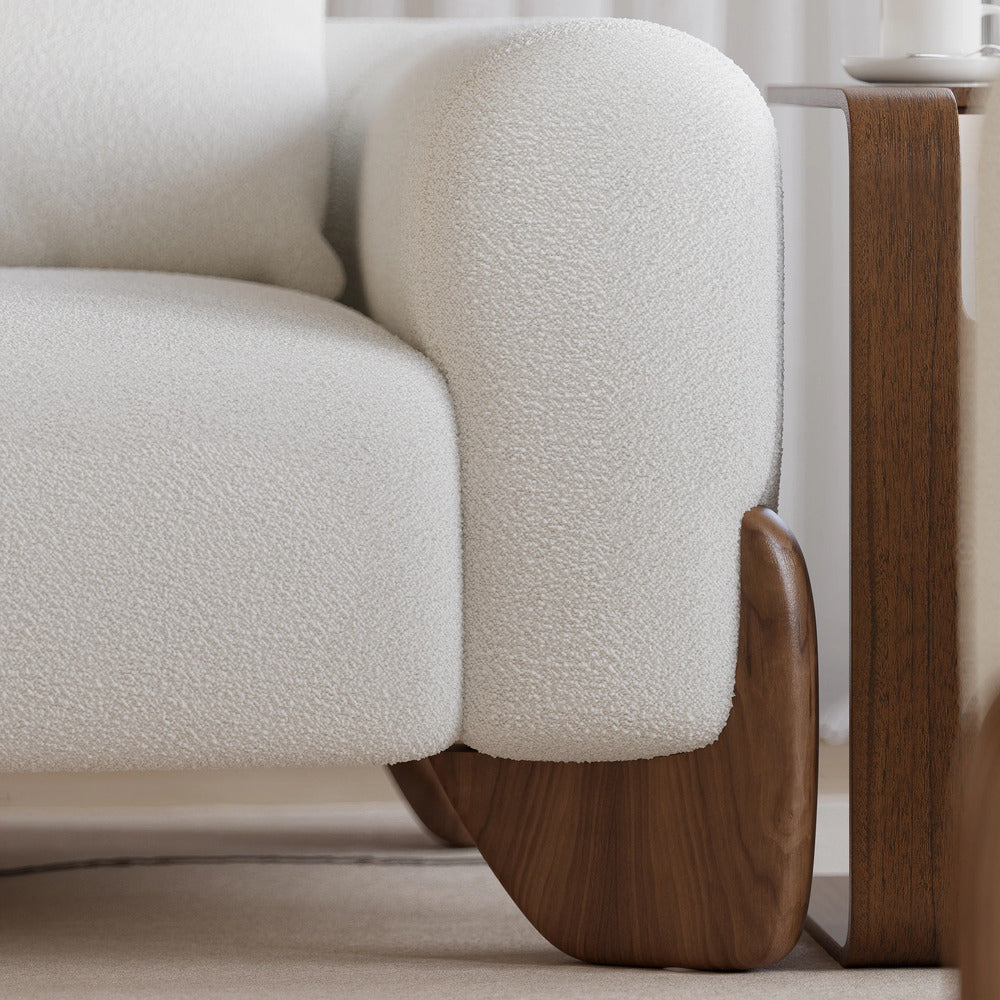 Close-up of a beige upholstered chair with wooden legs in dubai