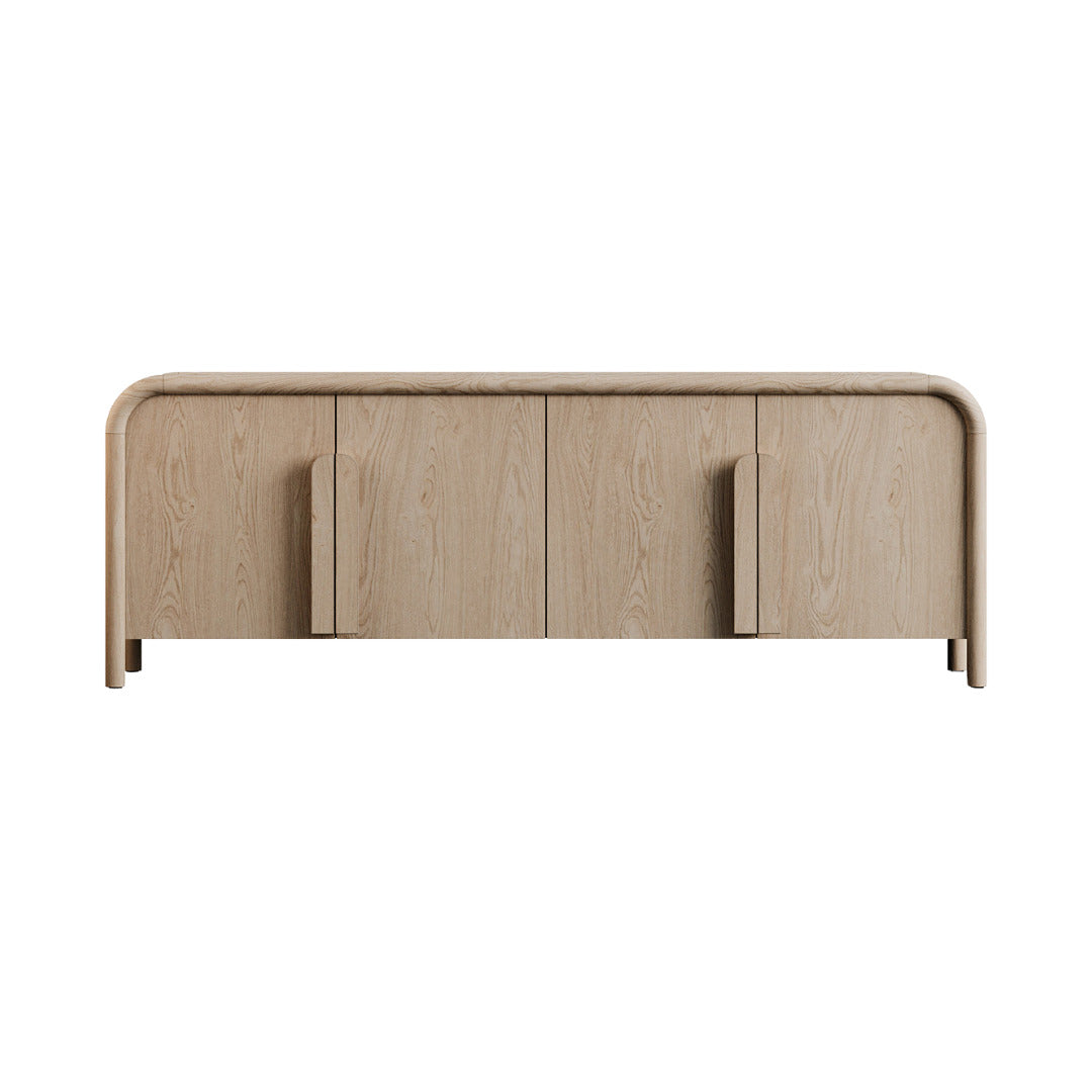 A light natural wood grain TV console with four door compartments and a gently rounded silhouette.